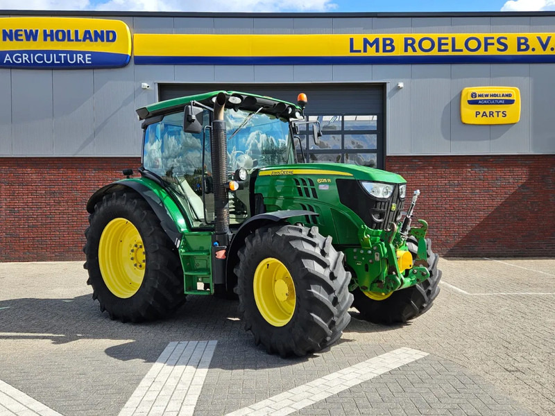 John Deere 6125R Autopower - Traktors: foto 1 John Deere 6125R Autopower - Traktors: foto 1
