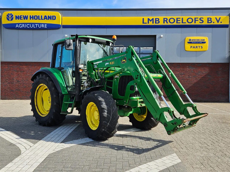 John Deere met 631 voorlader 6230 - Traktors: foto 1 John Deere met 631 voorlader 6230 - Traktors: foto 1