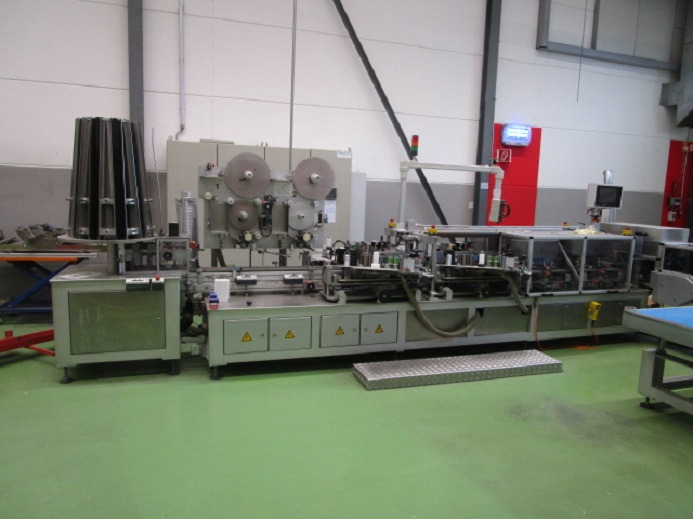 BECHER ETIKETTIERANLAGE SCHLEUTER GU 4S 6 - Iepakošanas mašīna: foto 2 BECHER ETIKETTIERANLAGE SCHLEUTER GU 4S 6 - Iepakošanas mašīna: foto 2