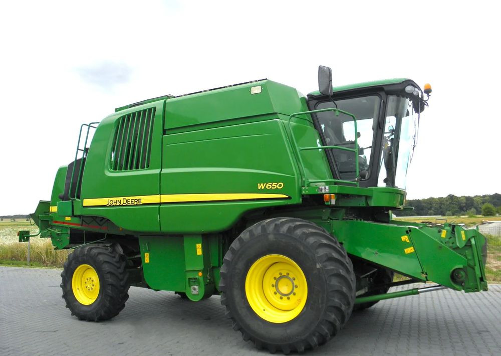 John Deere W650 2008 Rok, heder 6,7m, Nie Malowany, Stan Bardzo Dobry - Labības kombains: foto 2 John Deere W650 2008 Rok, heder 6,7m, Nie Malowany, Stan Bardzo Dobry - Labības kombains: foto 2