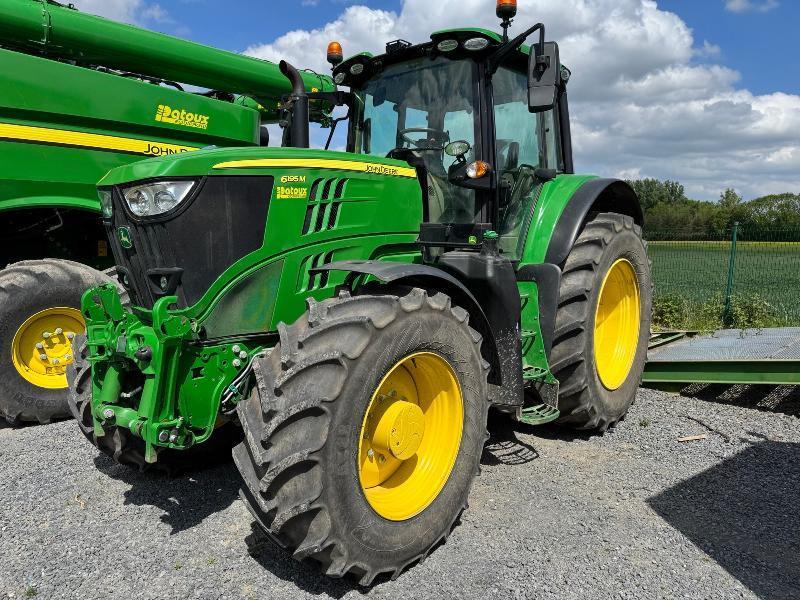 JOHN DEERE 6195M - Traktors: foto 1 JOHN DEERE 6195M - Traktors: foto 1