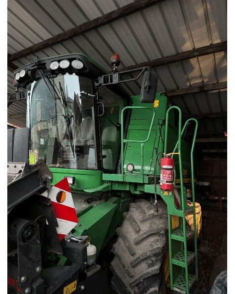 JOHN DEERE T560 - Labības kombains: foto 1 JOHN DEERE T560 - Labības kombains: foto 1