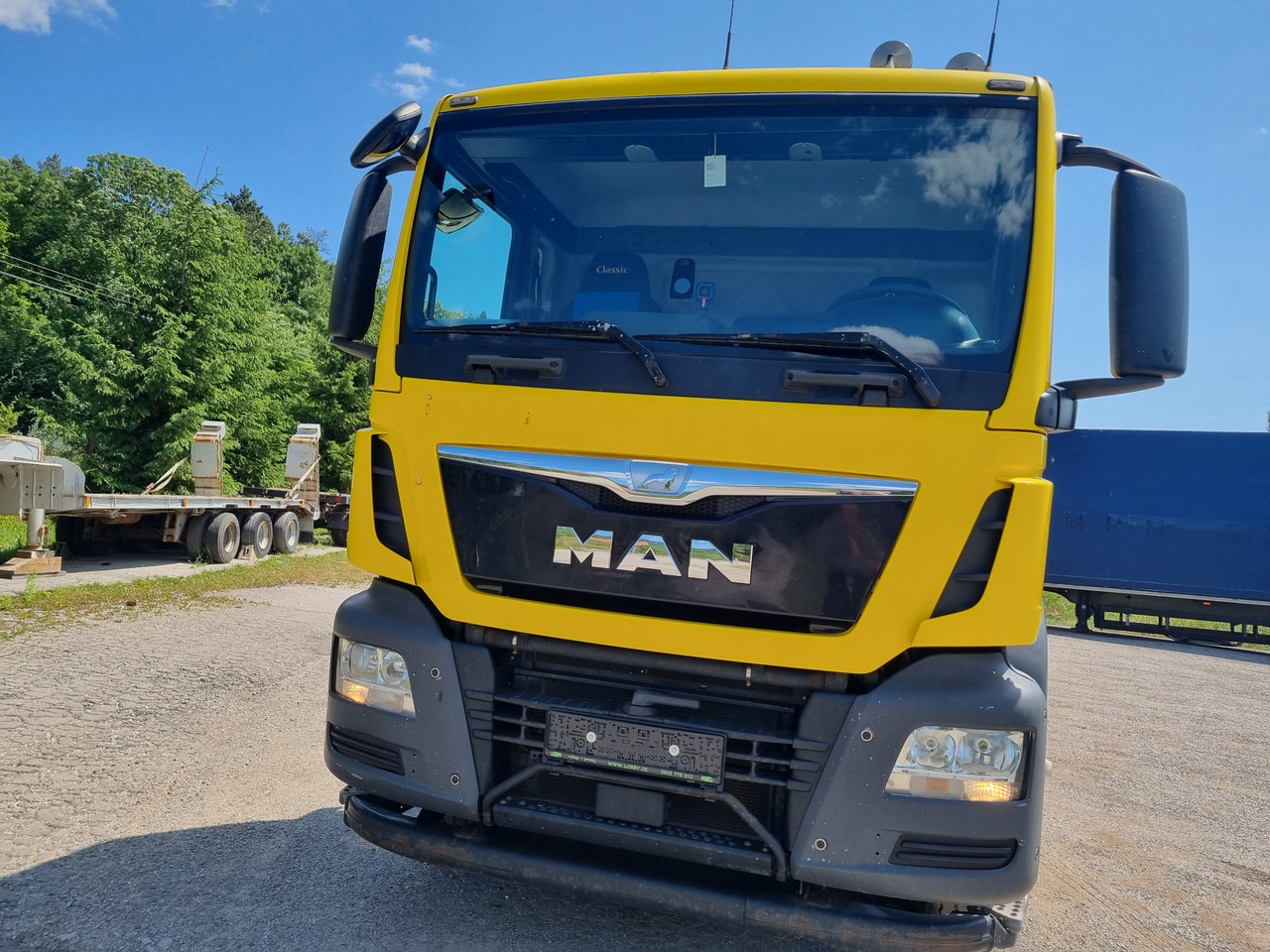 MAN TGS 33.480 6x4 ABROLLKIPPER HIAB Multilift 18 T - Pacēlājs ar āķi: foto 2 MAN TGS 33.480 6x4 ABROLLKIPPER HIAB Multilift 18 T - Pacēlājs ar āķi: foto 2