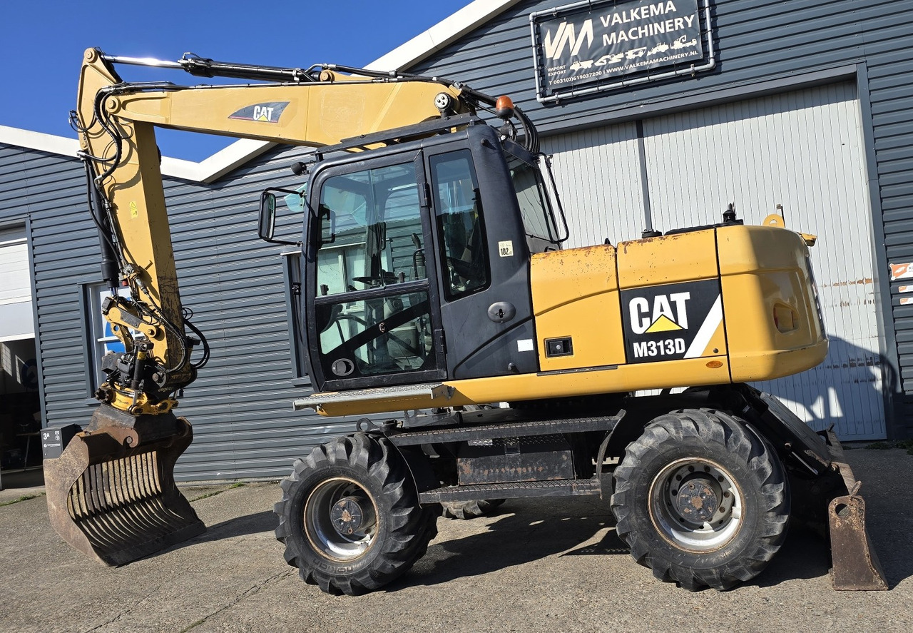 Riteņu ekskavators CATERPILLAR M313D: foto 8 Riteņu ekskavators CATERPILLAR M313D: foto 8
