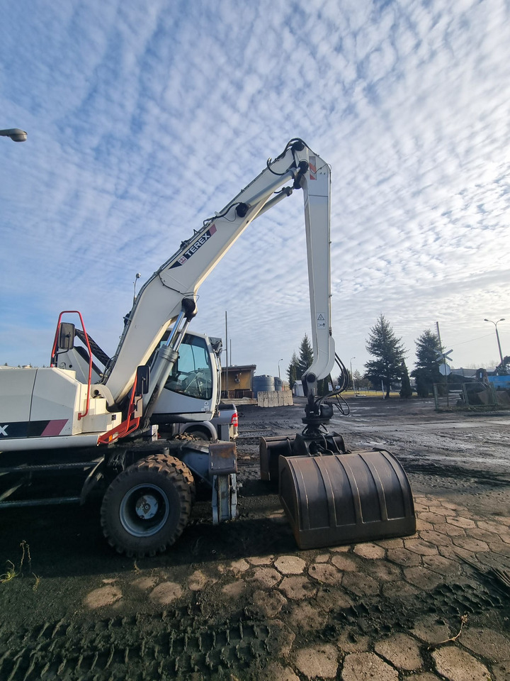 Terex TM 230 - Atkritumu iekrāvējs: foto 1 Terex TM 230 - Atkritumu iekrāvējs: foto 1