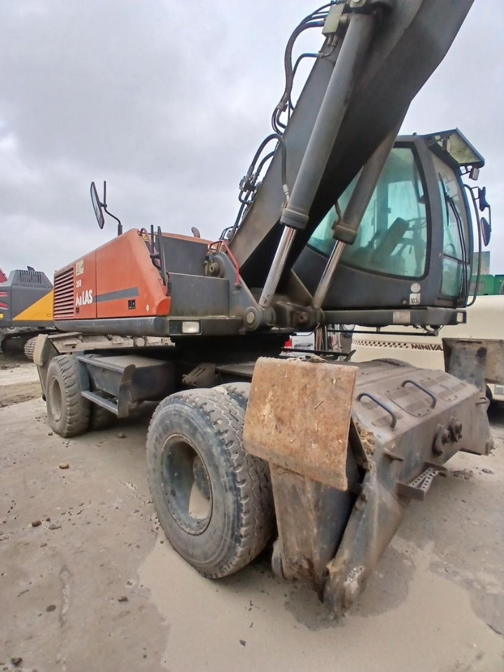 ATLAS MH350 - Atkritumu iekrāvējs: foto 1 ATLAS MH350 - Atkritumu iekrāvējs: foto 1