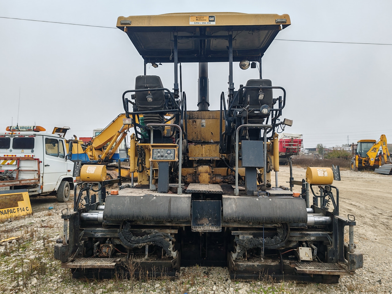 Caterpillar AP555E - Gudronators: foto 2 Caterpillar AP555E - Gudronators: foto 2