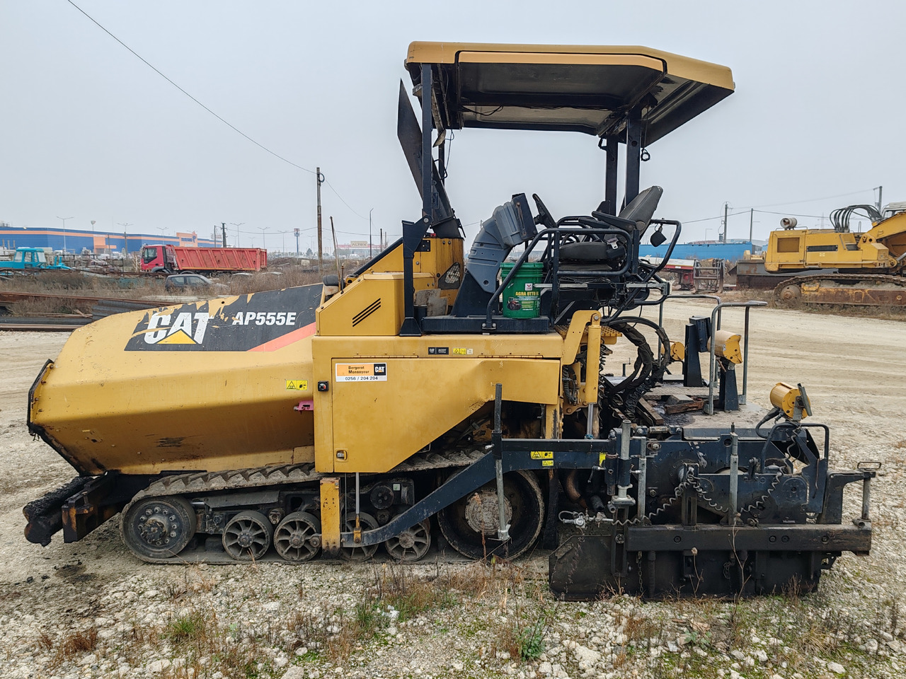 Caterpillar AP555E - Gudronators: foto 4 Caterpillar AP555E - Gudronators: foto 4