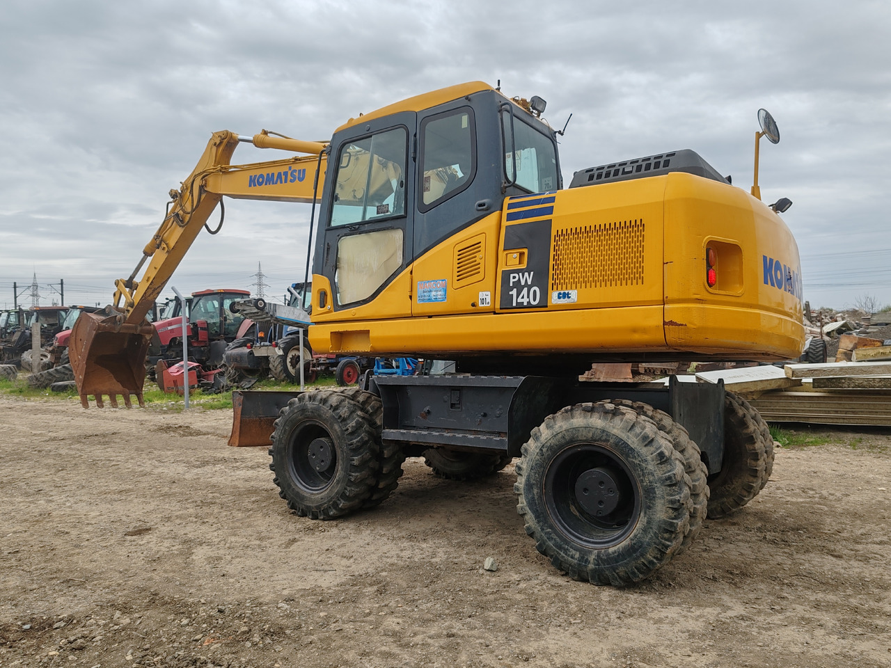 Komatsu PW140-7 - Riteņu ekskavators: foto 5 Komatsu PW140-7 - Riteņu ekskavators: foto 5