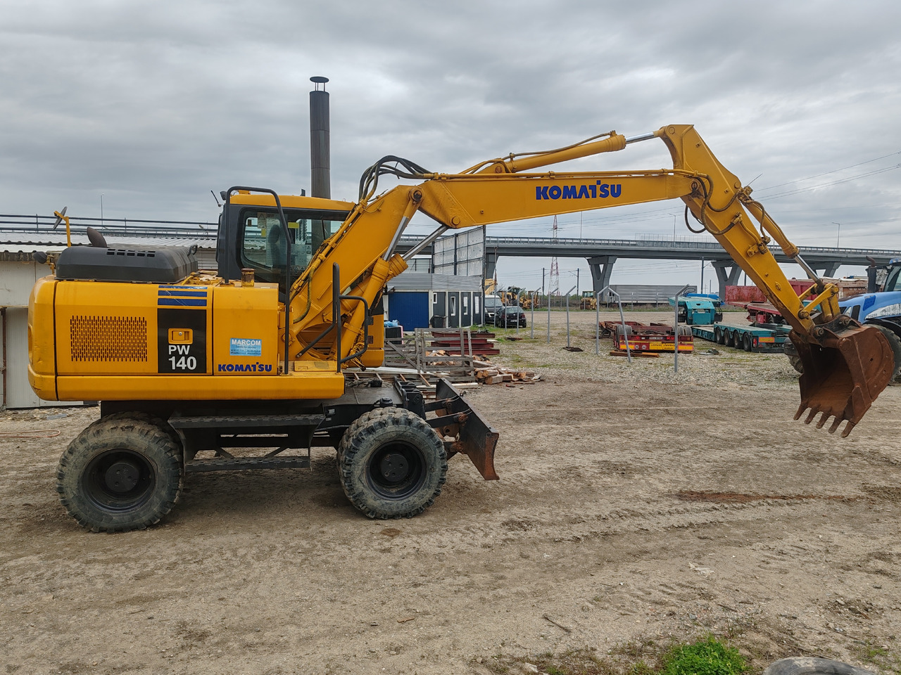 Komatsu PW140-7 - Riteņu ekskavators: foto 4 Komatsu PW140-7 - Riteņu ekskavators: foto 4