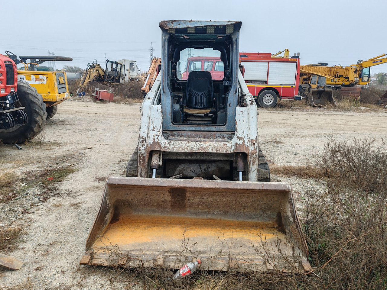 Takeuchi TL140 - Kāpurķēžu kompaktiekrāvējs: foto 2 Takeuchi TL140 - Kāpurķēžu kompaktiekrāvējs: foto 2