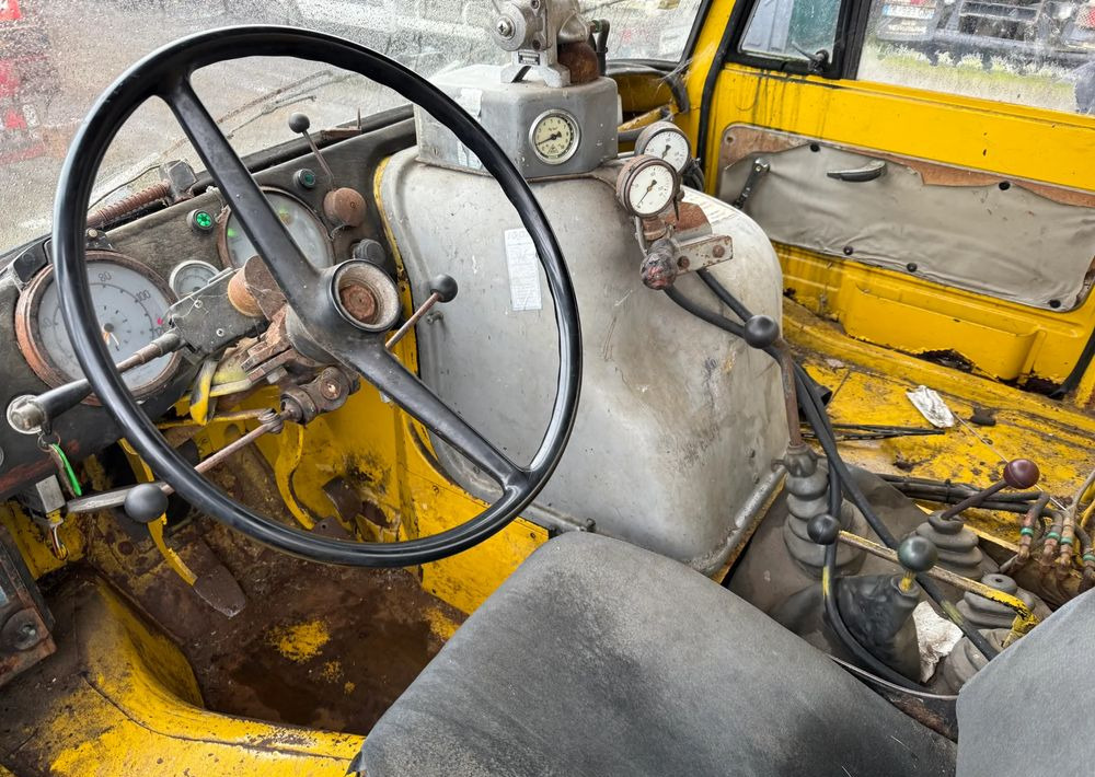 Kravas automašīna pašizgāzējs Mercedes-Benz UNIMOG 406B: foto 8 Kravas automašīna pašizgāzējs Mercedes-Benz UNIMOG 406B: foto 8