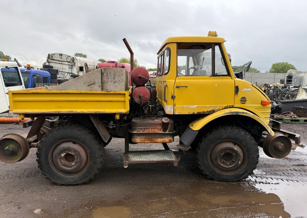 Mercedes-Benz UNIMOG 406B - Kravas automašīna pašizgāzējs: foto 5 Mercedes-Benz UNIMOG 406B - Kravas automašīna pašizgāzējs: foto 5