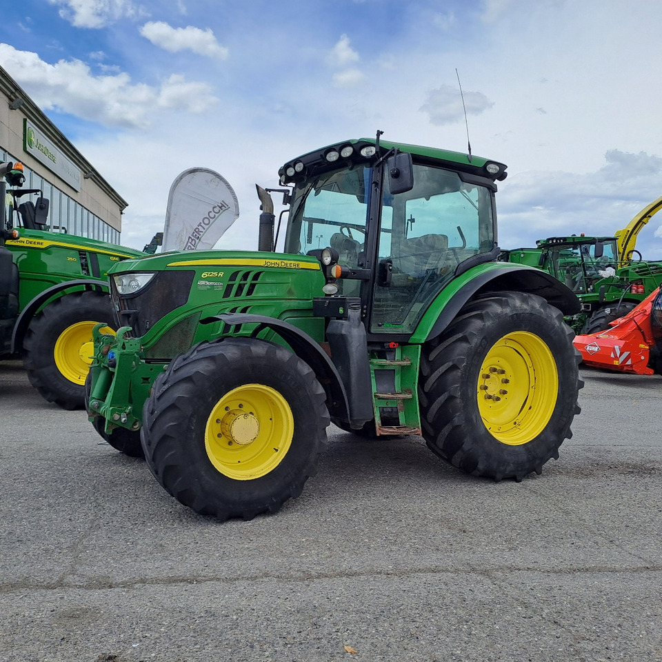 JOHN DEERE 6125R - Traktors: foto 1 JOHN DEERE 6125R - Traktors: foto 1