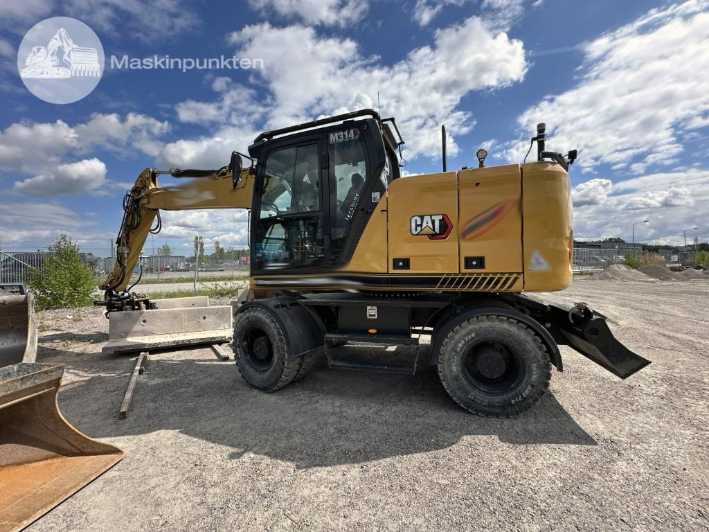 CAT M 314 - Riteņu ekskavators: foto 1 CAT M 314 - Riteņu ekskavators: foto 1