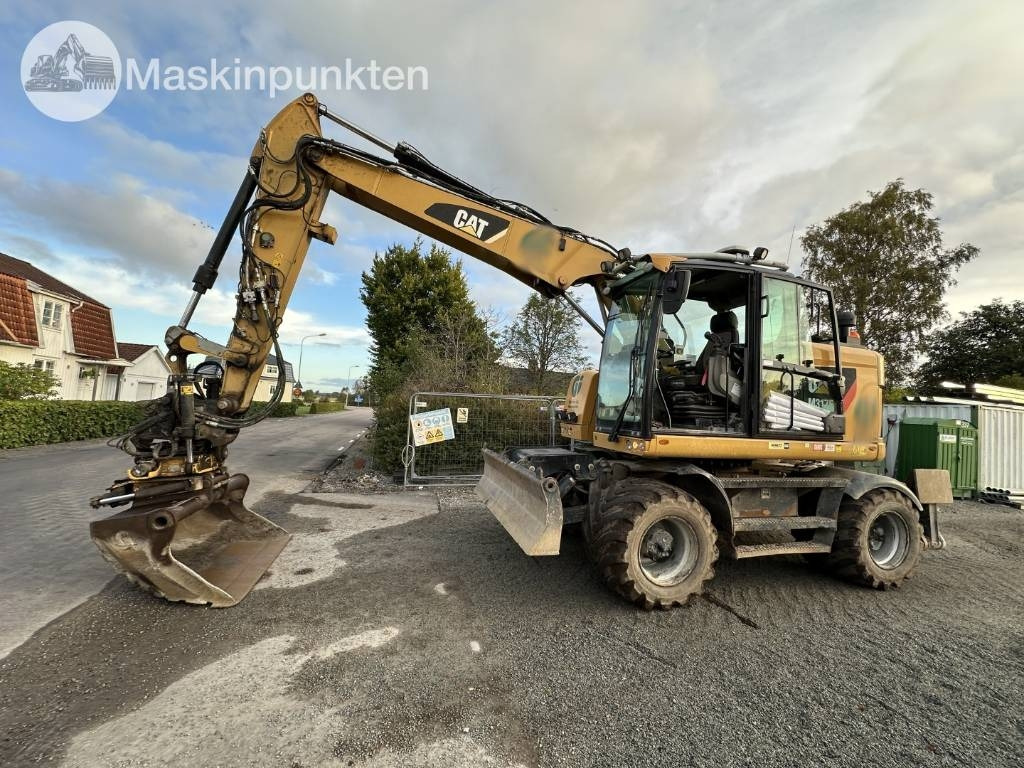 CAT M 317 - Riteņu ekskavators: foto 1 CAT M 317 - Riteņu ekskavators: foto 1