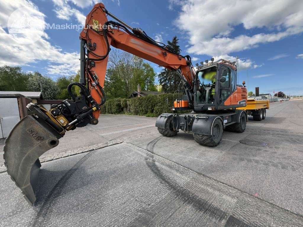 Doosan DX 160 W - Riteņu ekskavators: foto 1 Doosan DX 160 W - Riteņu ekskavators: foto 1
