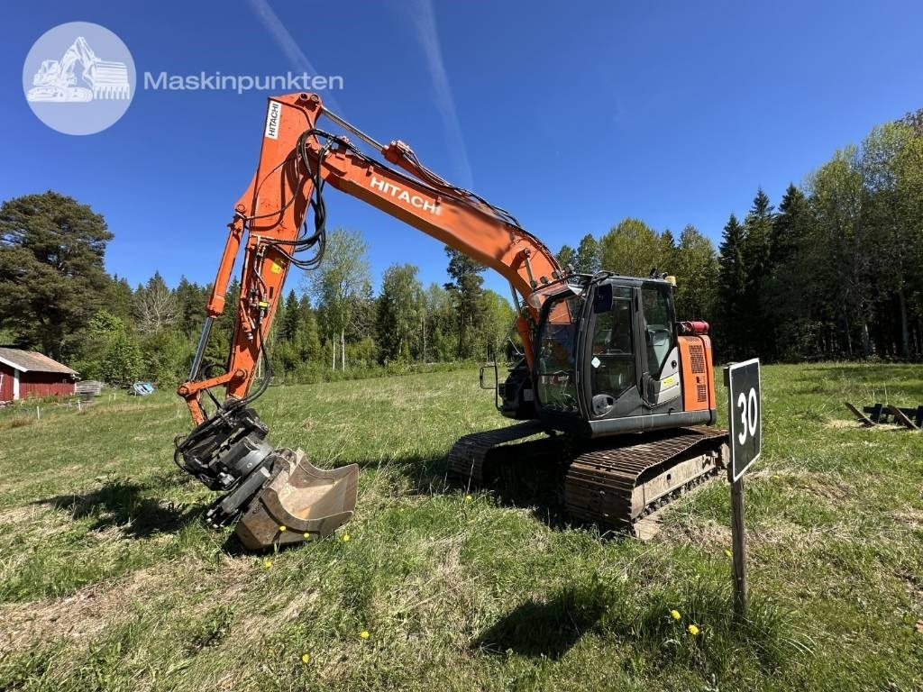 Hitachi ZX 135 US-6 - Kāpurķēžu ekskavators: foto 1 Hitachi ZX 135 US-6 - Kāpurķēžu ekskavators: foto 1