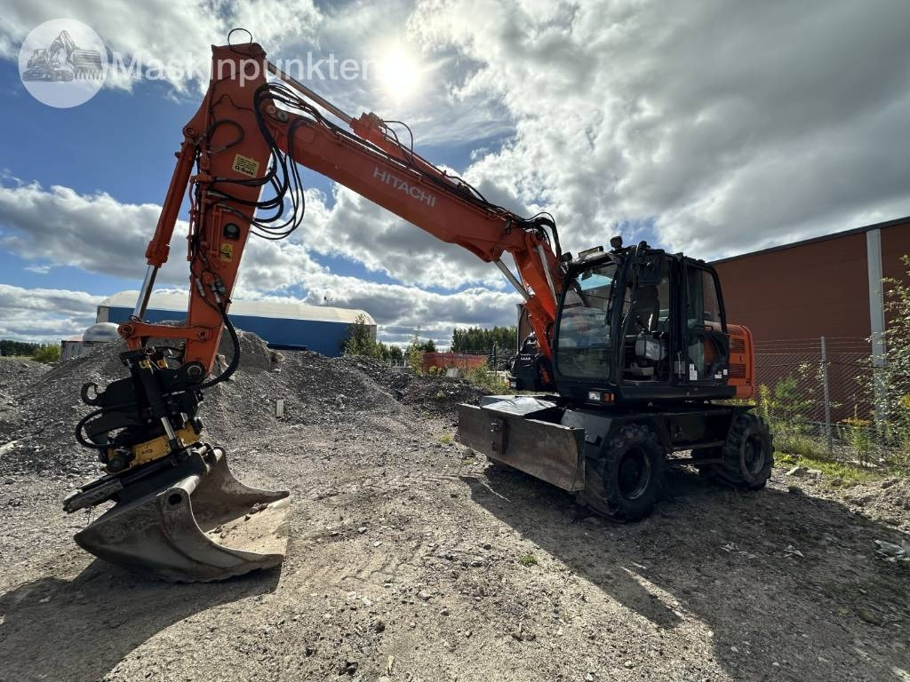 Hitachi ZX 140 W-5B - Riteņu ekskavators: foto 1 Hitachi ZX 140 W-5B - Riteņu ekskavators: foto 1