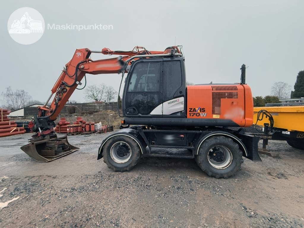 Hitachi ZX 170 W-5 B - Riteņu ekskavators: foto 1 Hitachi ZX 170 W-5 B - Riteņu ekskavators: foto 1