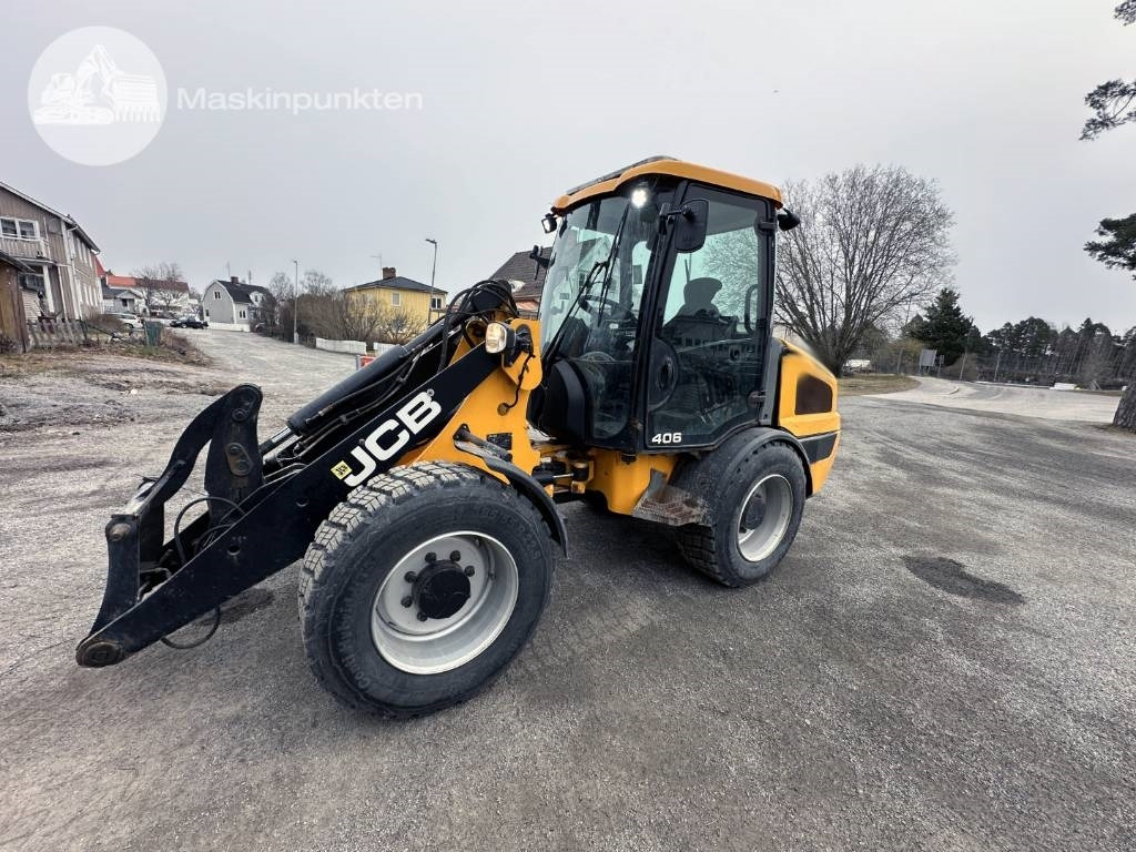 JCB 406 - Riteņu iekrāvējs: foto 1 JCB 406 - Riteņu iekrāvējs: foto 1