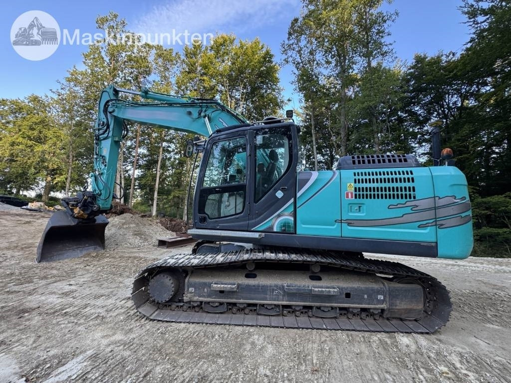 Kobelco SK 210 LC-10 - Kāpurķēžu ekskavators: foto 2 Kobelco SK 210 LC-10 - Kāpurķēžu ekskavators: foto 2
