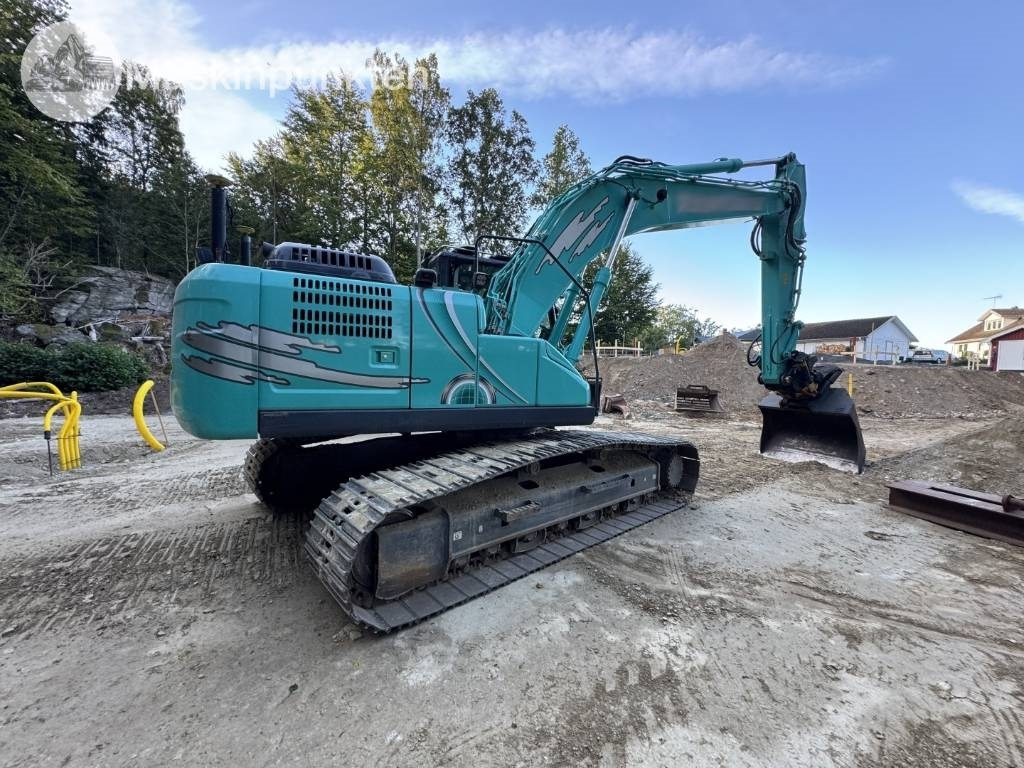 Kobelco SK 210 LC-10 - Kāpurķēžu ekskavators: foto 4 Kobelco SK 210 LC-10 - Kāpurķēžu ekskavators: foto 4