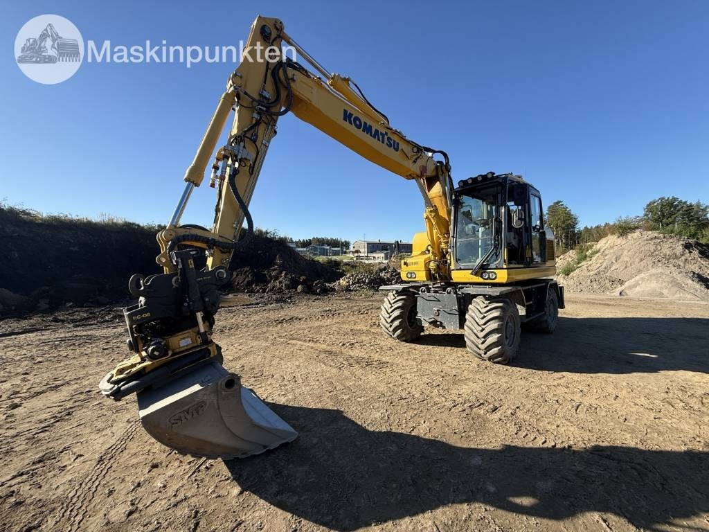 Komatsu PW 160 - Riteņu ekskavators: foto 1 Komatsu PW 160 - Riteņu ekskavators: foto 1