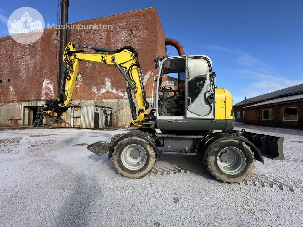Wacker Neuson EW 100 - Riteņu ekskavators: foto 1 Wacker Neuson EW 100 - Riteņu ekskavators: foto 1