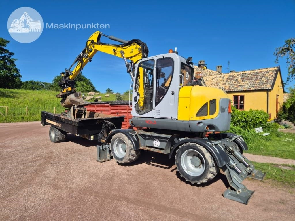 Wacker Neuson EW 100 med vagn - Riteņu ekskavators: foto 1 Wacker Neuson EW 100 med vagn - Riteņu ekskavators: foto 1