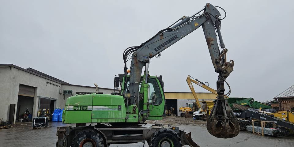 Koparka kołowa Liebherr A 316 Litronic chwytak podpory pług - Riteņu ekskavators: foto 4 Koparka kołowa Liebherr A 316 Litronic chwytak podpory pług - Riteņu ekskavators: foto 4