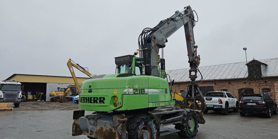 Koparka kołowa Liebherr A 316 Litronic chwytak podpory pług - Riteņu ekskavators: foto 5 Koparka kołowa Liebherr A 316 Litronic chwytak podpory pług - Riteņu ekskavators: foto 5