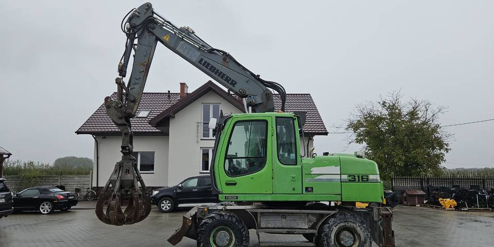 Koparka kołowa Liebherr A 316 Litronic chwytak podpory pług - Riteņu ekskavators: foto 1 Koparka kołowa Liebherr A 316 Litronic chwytak podpory pług - Riteņu ekskavators: foto 1
