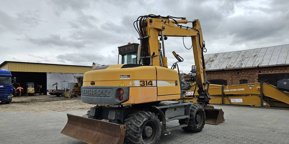 Riteņu ekskavators Koparka kołowa Liebherr A314 Litronic 9350 h 4 łyżki kołówka: foto 6