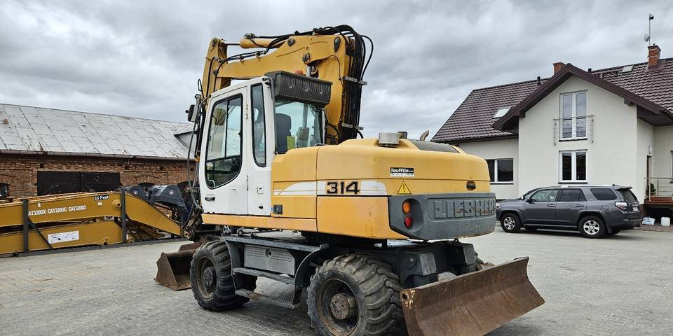 Riteņu ekskavators Koparka kołowa Liebherr A314 Litronic 9350 h 4 łyżki kołówka: foto 8