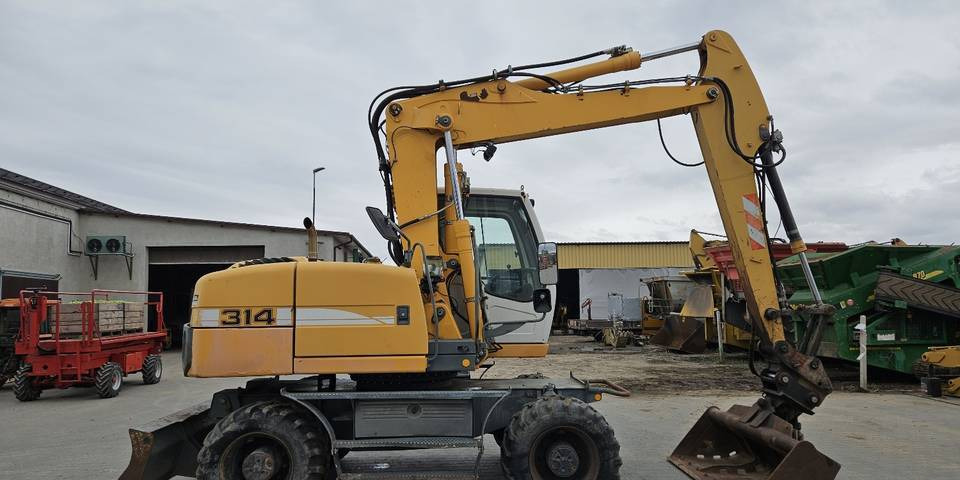 Koparka kołowa Liebherr A314 Litronic 9350 h 4 łyżki kołówka - Riteņu ekskavators: foto 5 Koparka kołowa Liebherr A314 Litronic 9350 h 4 łyżki kołówka - Riteņu ekskavators: foto 5