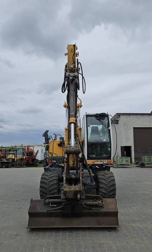 Koparka kołowa Liebherr A314 Litronic 9350 h 4 łyżki kołówka - Riteņu ekskavators: foto 3 Koparka kołowa Liebherr A314 Litronic 9350 h 4 łyżki kołówka - Riteņu ekskavators: foto 3