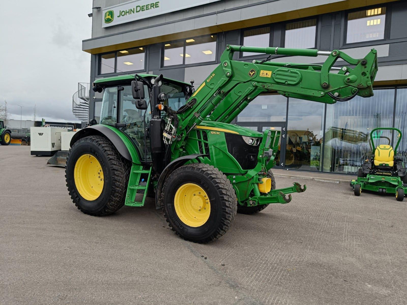 John Deere 6115 RC - Traktors: foto 1 John Deere 6115 RC - Traktors: foto 1