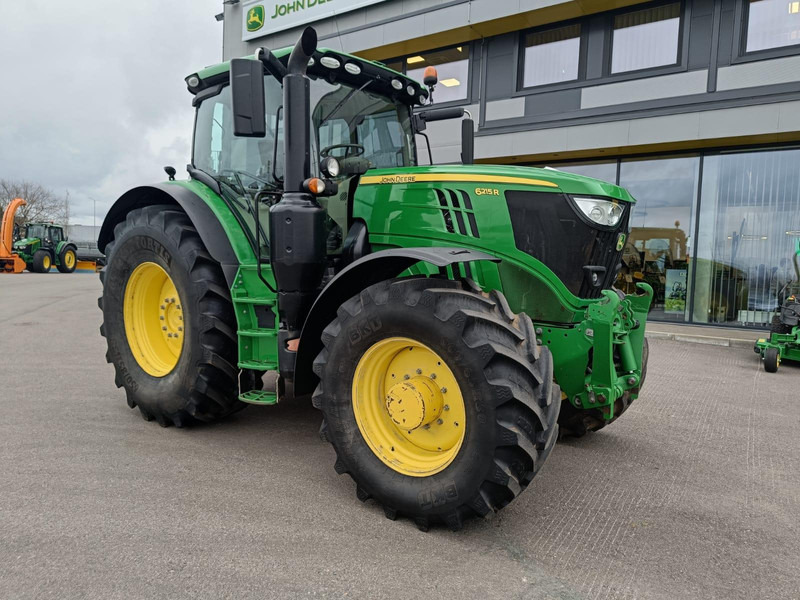 John Deere 6215R - Traktors: foto 1 John Deere 6215R - Traktors: foto 1