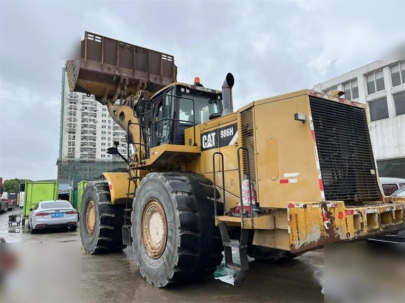 CATERPILLAR 986H - Riteņu iekrāvējs: foto 1 CATERPILLAR 986H - Riteņu iekrāvējs: foto 1