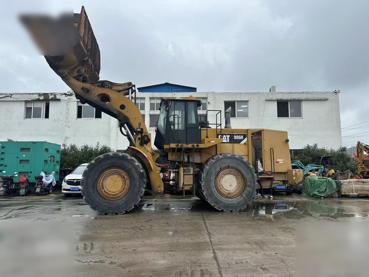 CATERPILLAR 986H - Riteņu iekrāvējs: foto 1 CATERPILLAR 986H - Riteņu iekrāvējs: foto 1