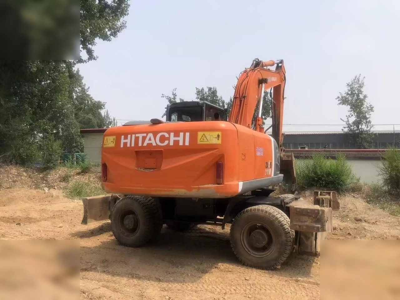 HITACHI ZX210W - Riteņu ekskavators: foto 5 HITACHI ZX210W - Riteņu ekskavators: foto 5