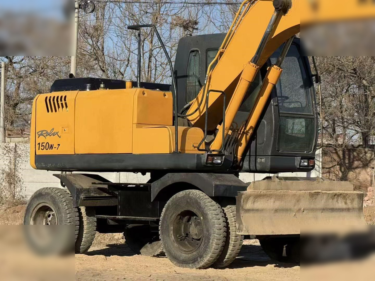 HYUNDAI ROBEX 150W-7A - Riteņu ekskavators: foto 4 HYUNDAI ROBEX 150W-7A - Riteņu ekskavators: foto 4