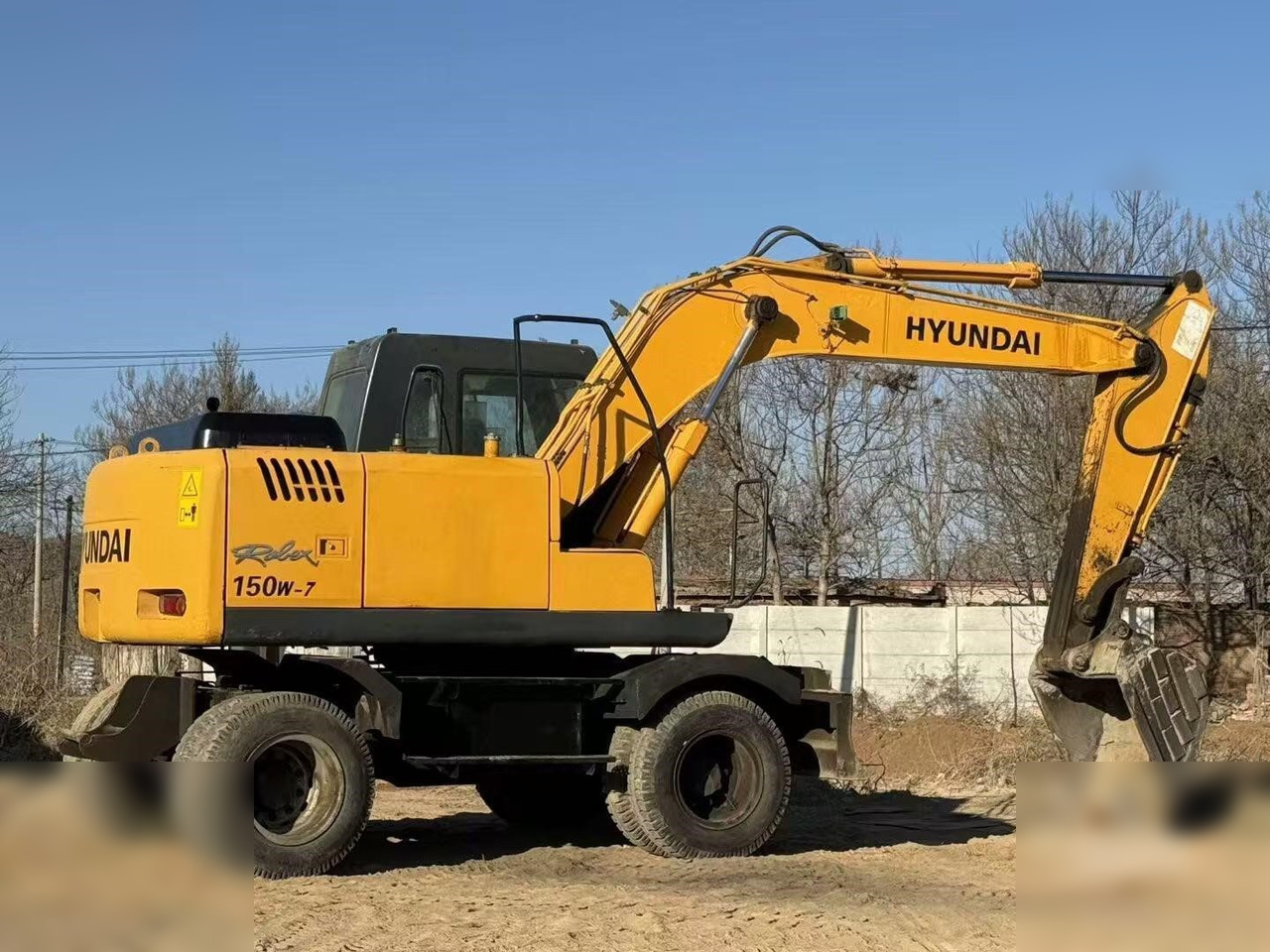 HYUNDAI ROBEX 150W-7A - Riteņu ekskavators: foto 2 HYUNDAI ROBEX 150W-7A - Riteņu ekskavators: foto 2