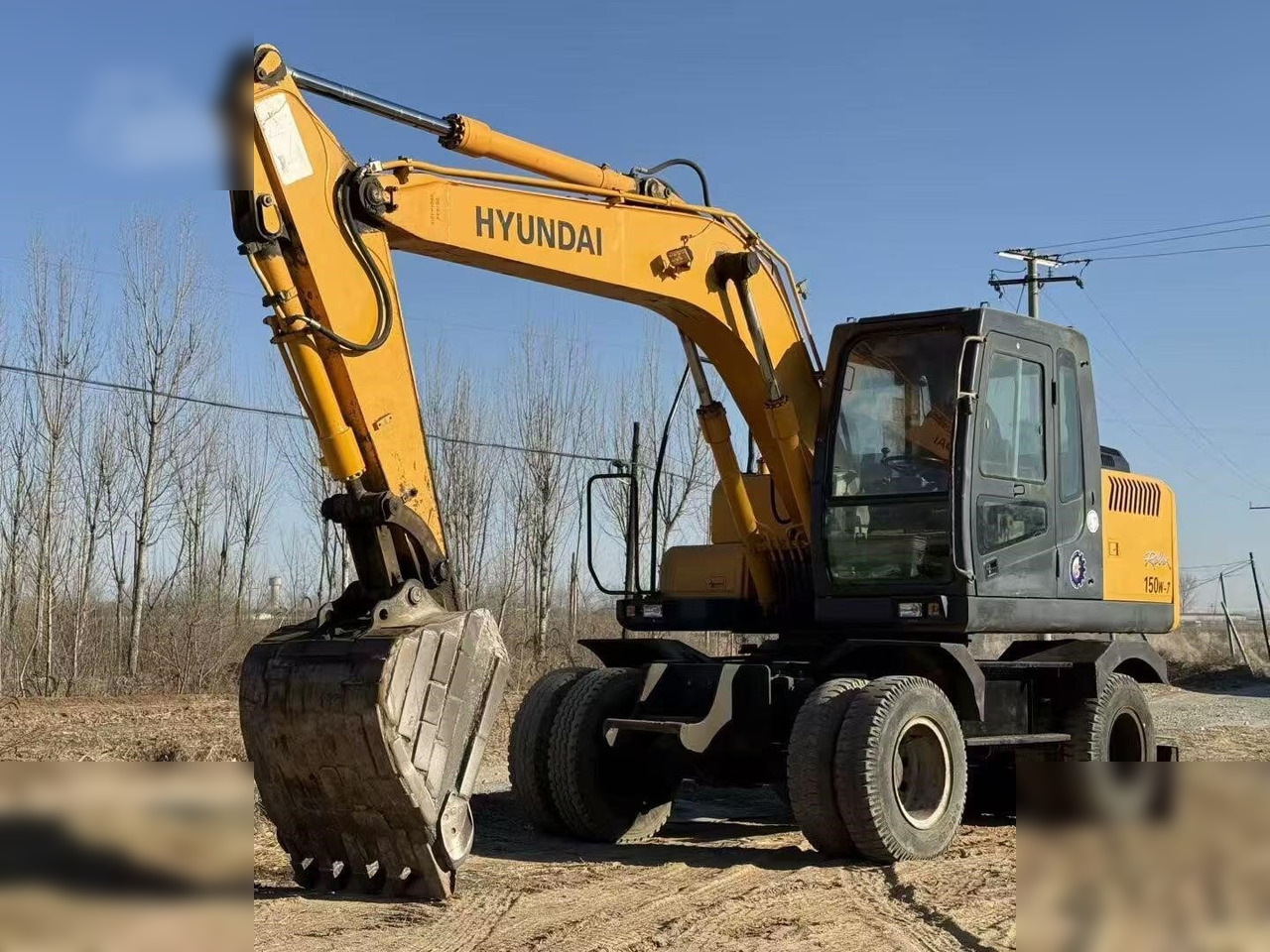 HYUNDAI ROBEX 150W-7A - Riteņu ekskavators: foto 3 HYUNDAI ROBEX 150W-7A - Riteņu ekskavators: foto 3