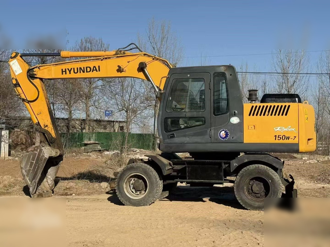HYUNDAI ROBEX 150W-7A - Riteņu ekskavators: foto 1 HYUNDAI ROBEX 150W-7A - Riteņu ekskavators: foto 1