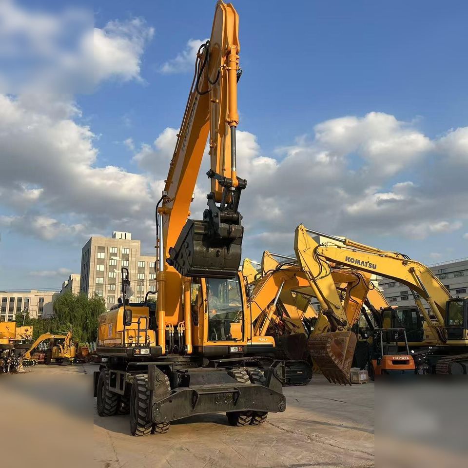 HYUNDAI ROBEX 210W-9 - Riteņu ekskavators: foto 4 HYUNDAI ROBEX 210W-9 - Riteņu ekskavators: foto 4