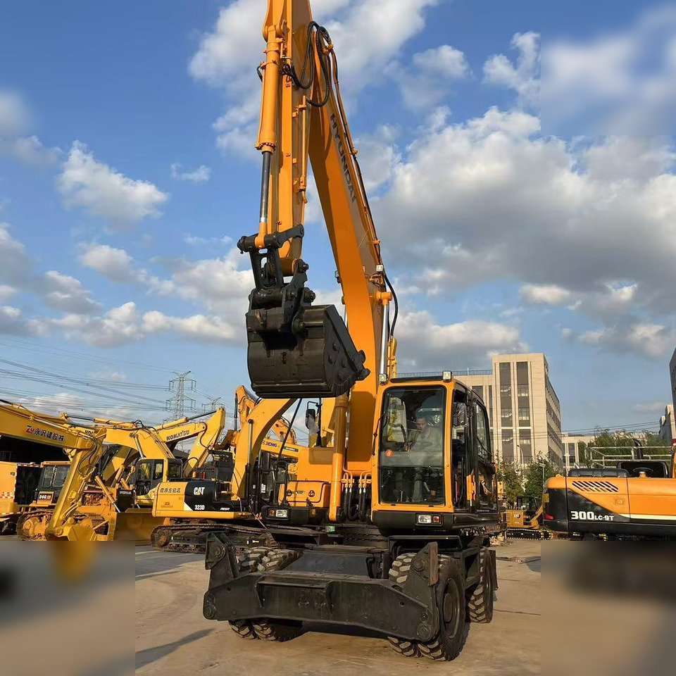 HYUNDAI ROBEX 210W-9 - Riteņu ekskavators: foto 2 HYUNDAI ROBEX 210W-9 - Riteņu ekskavators: foto 2