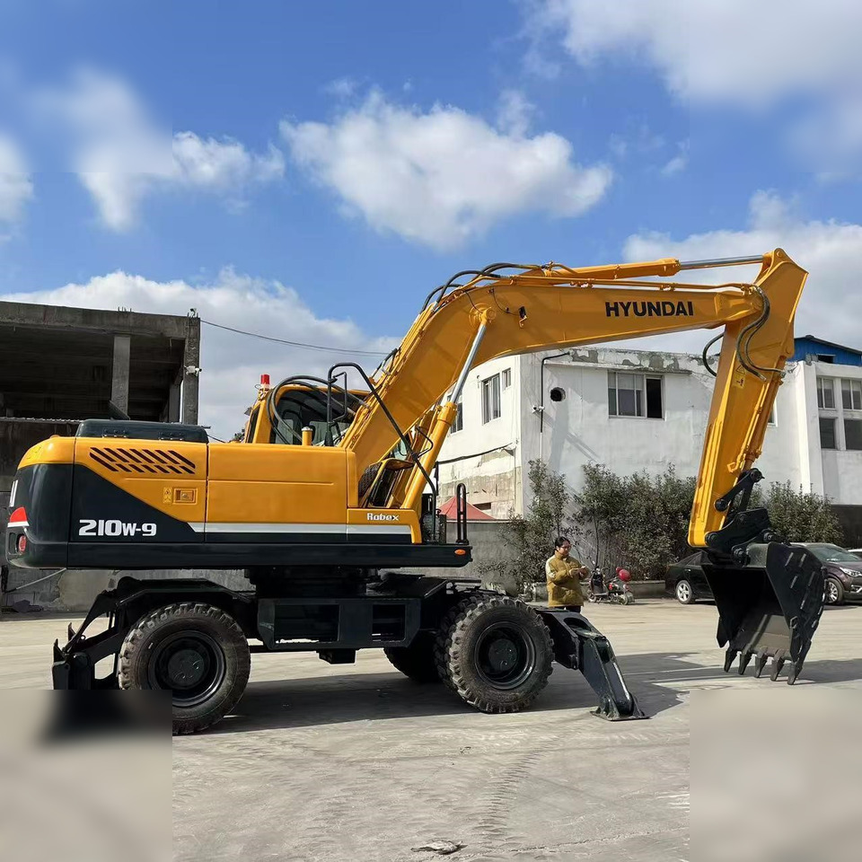 HYUNDAI ROBEX 210W-9 - Riteņu ekskavators: foto 3 HYUNDAI ROBEX 210W-9 - Riteņu ekskavators: foto 3