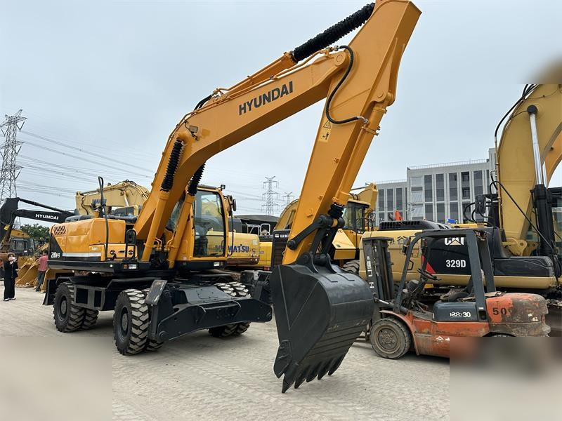 HYUNDAI ROBEX 210W-9 - Riteņu ekskavators: foto 3 HYUNDAI ROBEX 210W-9 - Riteņu ekskavators: foto 3